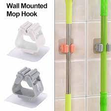 The hooks are spaced to hang larger items, such as buckets and brooms. Material Handling Products 8 Pack White 3 H Broom Mop Holder Kitchen And Wardrobe Broom Gripper Holds Self Adhesive Reusable No Drilling Anti Slip Wall Mounted Storage Rack Storage Organization For Home Storage