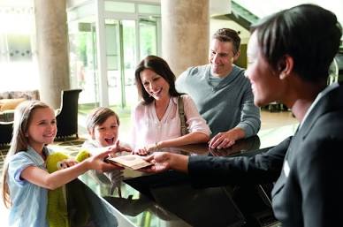 DoubleTree front desk reception and warm cookie welcome, AI generated