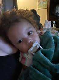 Baby's braided hairstyle with medium boho knotless