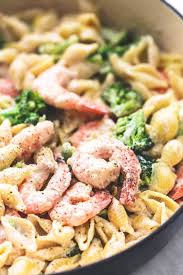 Next, the remaining butter, water, cream cheese, and parmesan cheese are added to the pan. Shrimp And Broccoli Alfredo Creme De La Crumb