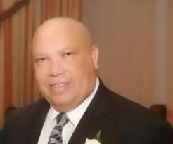 Rev. Dr. Genius Wells, J.P.