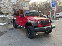 Image result for Flame Red 2009 Jeep