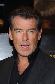 Men S Suit Lookbook Pierce Brosnan Wearing Men S Suit 20 Of 23 Pierce Bronson Showed Off His Dapper Style In A Grey Suit Menssuits Dapp Personajes Frases