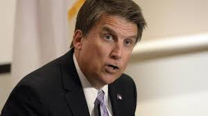 LGBT protections end as NC governor signs bill