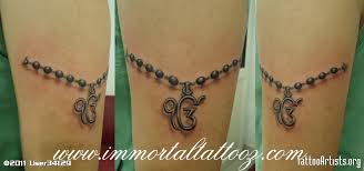 Om tattoo with trishul designs for the inner arm. 48 Religious Ek Onkar Tattoos