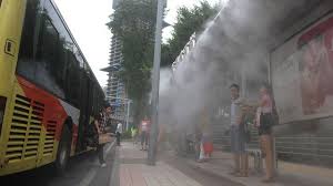 chinese bus stops spray cooling mist on overheated commuters bus stops mists passenger