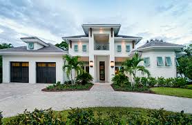 Many would like to live there but fear that a home purchase in one of the nation's most coveted cities is chances are, you could fall madly in love with an area of miami you never considered before. Naples Fl West Indies Style Home Modern Exterior Miami By Royal Properties Of Naples Houzz Au