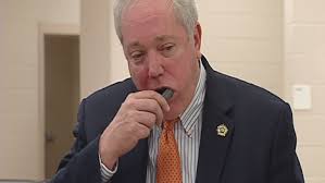 Sheriff demonstrates DNA sampling during arrests