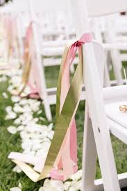 Taylor Sterling S Wedding Details Theglitterguide Com Maybe Tie Ribbons O Wedding Chair Decorations Wedding Aisle Decorations Outdoor Wedding Decorations