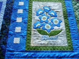 To prolong your embroidered quilt's lifespan, keep the quilting density consistent across the entire quilt—even if that means adding stitching sometimes stitching over the embroidery is the best option—especially if the fabric needs stabilization or the quilt will see heavy use (such as a baby quilt.) How To Quilt Embroidery On Quilts Apqs