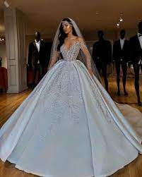 Luxurious Sparkly 2019 African Wedding Dresses Sheer Neck Long Sleeves Bridal Dresses Beaded Sequins Satin Wedding Gowns From Chic Cheap 215 28 Dhgate Com Sheer Wedding Dress Ball Gown Wedding Dress White Ball Gowns