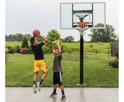 And you can't shoot hoops without a basketball hoop. All American Adjustable Basketball Hoop Rainbow Play Systems Spectrum Superstores