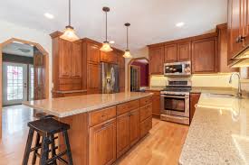 And her wall of pretty wooden pieces. 1990s Colonial Home Kitchen Remodel Degnan Design Build Remodel