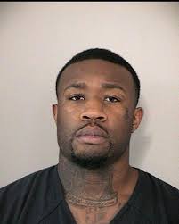 Cops: Purse-snatcher is also accused murderer