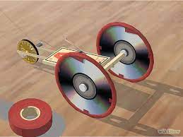 If a mousetrap car is spinning its wheels at the start or you need a longer pulling string then increasing the length of the lever arms will decrease the pulling force and increase the length of the pulling string. How To Adapt A Mousetrap Car For Distance Mousetrap Car Physics Projects Science Projects