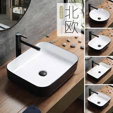 Countertop basins are sinks that sit on top of a vanity unit, rather than being set inside it. Black Bathroom Countertop Sinks With Pull Out Faucet Modern Ceramic Toilet Washbasin Square Basin European Art Home Basin Russia Bathroom Sinks Aliexpress