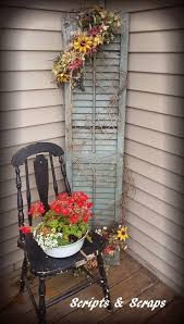 25 Diy Decorating Ideas To Spring Up Your Front Porch Vintage Porch Porch Decorating Shutter Decor