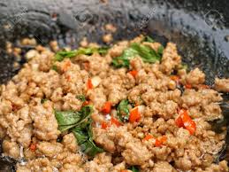 When all the ingredients are cooked, add the red bell pepper and the thai holy basil. Cooking For Spicy Thai Basil Minced Pork Or Pad Ga Prao Stock Photo Picture And Royalty Free Image Image 123655477