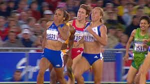 Holmes specialised in the 800 metres and 1,500 metres events and won a gold medal for both distances at the 2004 summer olympics in athens.she set british records in numerous events and still holds the records over the 600, 800 and 1,000 metre distances. Bbc One Gold Rush Our Race To Olympic Glory Series 1 Episode 1 Kelly Holmes Fights Back After Injury