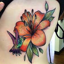 Hummidbird Tattoo 7 Tattoo Journal Com The New Way To Design Your Body Hummingbird Tattoo Hummingbird Tattoo Meaning Lily Flower Tattoos