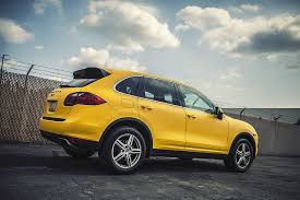 porsche cayenne wrapped with 3m 1080 m15 matte yellow by rolotech car wraps car wrap porsche matte cars rolotech car wraps car wrap porsche