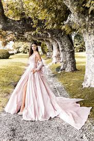 Open back and end of sleeves are framed with french lace. 15 Colored Minimalist Wedding Dresses That Are Simple Yet Memorable Praise Wedding