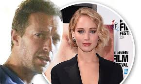 Chris Martin revealed that 'he is very much still dating Jennifer Lawrence' 