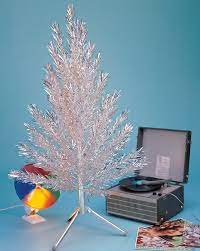 The Short Life And Awesome Resurgence Of The Aluminum Christmas Tree Aluminum Christmas Tree Tinsel Christmas Tree Christmas Tree Decorations