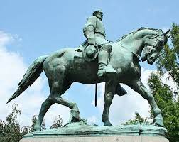 Flemington race track is shown in the background. Man Riding Horse Statue Statue Bronze Horse Equestrian Bronze Horse Piqsels