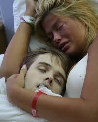 Anna Nicole Smith holds her dead son moments after he ODs