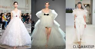 Un abito unico, che tenga incollati… un 1980, pizzo bianco, abito pronovias con dettaglio bussle e arco e un collo alto. Abiti Da Sposa Particolari Giambattista Valli Modelli Da Sogno In Passerella