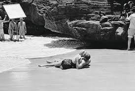 There is an unforgettable romantic kissing scene between these two, while lying on the beach with the waves washing up over them. Peter Oxley On Twitter From Here To Eternity 1953 Behind The Scenes Of The Famous Beach Scene With Burt Lancaster And Deborah Kerr