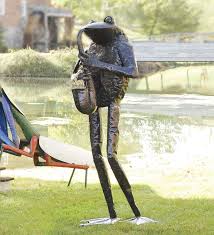 The frog will not do well on much larger pots. Handmade Metal Giant Saxophone Frog Garden Art Sculpture This Will Stop And Make Them Look Garden Art Sculptures Metal Sculptures Garden Metal Garden Art