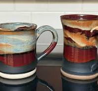 Testing new engobes on ceramic mugs with different colors