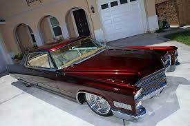 Image result for Claret Maroon 1966 Cadillac