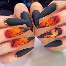 Matte Black Halloween Themed Nails Stiletto Shaped With Two Accent Gothic Spooky Nails 2020 Halloween Acrylic Nails Halloween Nail Designs Cute Halloween Nails