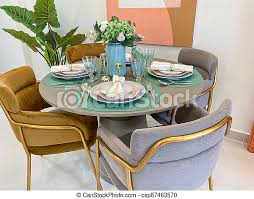Whether you need a dining table set of 6 seater or a dining table set of 4 seater or a 2 seater dining set hometown has endless options to suit your needs. Cozy Round Dining Table With Four Chairs In Modern Kitchen Interior Design Of Modern Round Dining Table With Four Chairs And Canstock