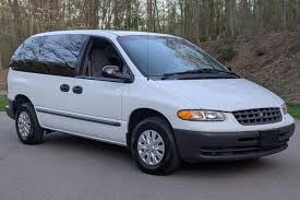 Image result for Bright Silver 2000 Caravan