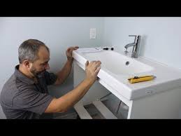How To Install An Ikea Bathroom Wall Mount Vanity Cabinet Sink And Faucet Youtube Vanity Cabinet Wall Mounted Vanity Ikea Bathroom