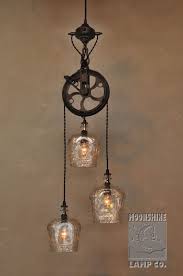 This Beautiful 3 Light Version Of Our Most Popular Fixtures Features A 7 75 Pulley Wheel Brass Body And Three Pulley Light Farmhouse Lighting Rustic Lighting
