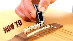 How To Remove Guitar Strings - Acoustic Guitar Maintenance - Youtube
