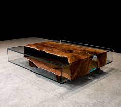 You might consider placing a piece of tempered glass on top. Walnut Wrapped Glass Coffee Table Living Room Modern Wood Furniture Glass Furniture Wood Furniture Design