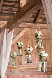 This Rustic Barn Wedding Nails County Decor We Re Loving How The Decor Included Mason Jar Flower Hol Rustic Wedding Details Rustic Barn Wedding Rustic Wedding