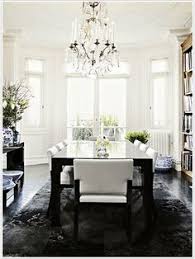 There's just something about the classic black and white combo that can't be replicated by any other design. Bring It Home Fancy Fixtures Black And White Dining Room White Dining Room Home