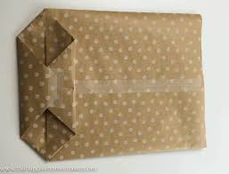 Place you box on the paper and wrap like you would any gift. How To Make A Gift Bag Out Of Wrapping Paper Easy Diy Tutorial