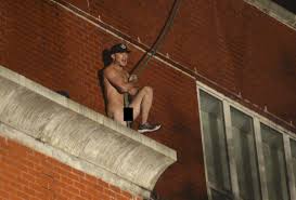 SEE IT: Naked man straddling hose threatens to leap from West Village  rooftop – New York Daily News