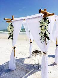 White Sheers Bamboo Arbor Naples Beach Wedding Ft Myers Beach Wedding Flower Accents Fresh Flowers Sanib Beach Wedding Arch Wedding Draping Wedding Arch