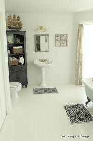 The toy sharks add some beach bathroom feel. Nautical Themed Bathroom Design The Country Chic Cottage