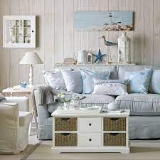Coastal cottage décor combines maritime themes with a rustic touch, and you can emphasize it with even more distressed elements and an abundance of cozy textures. Coastal Living Rooms To Recreate Carefree Beach Days
