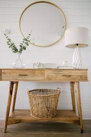 If you prefer a different approach, settle on a sectional. Foyer Decor With Mid Century Modern Console Table Textured Table Lamp Faux Gre Console Decor Faux Foyer Gre Foyer Decor Foyer Decorating Decor